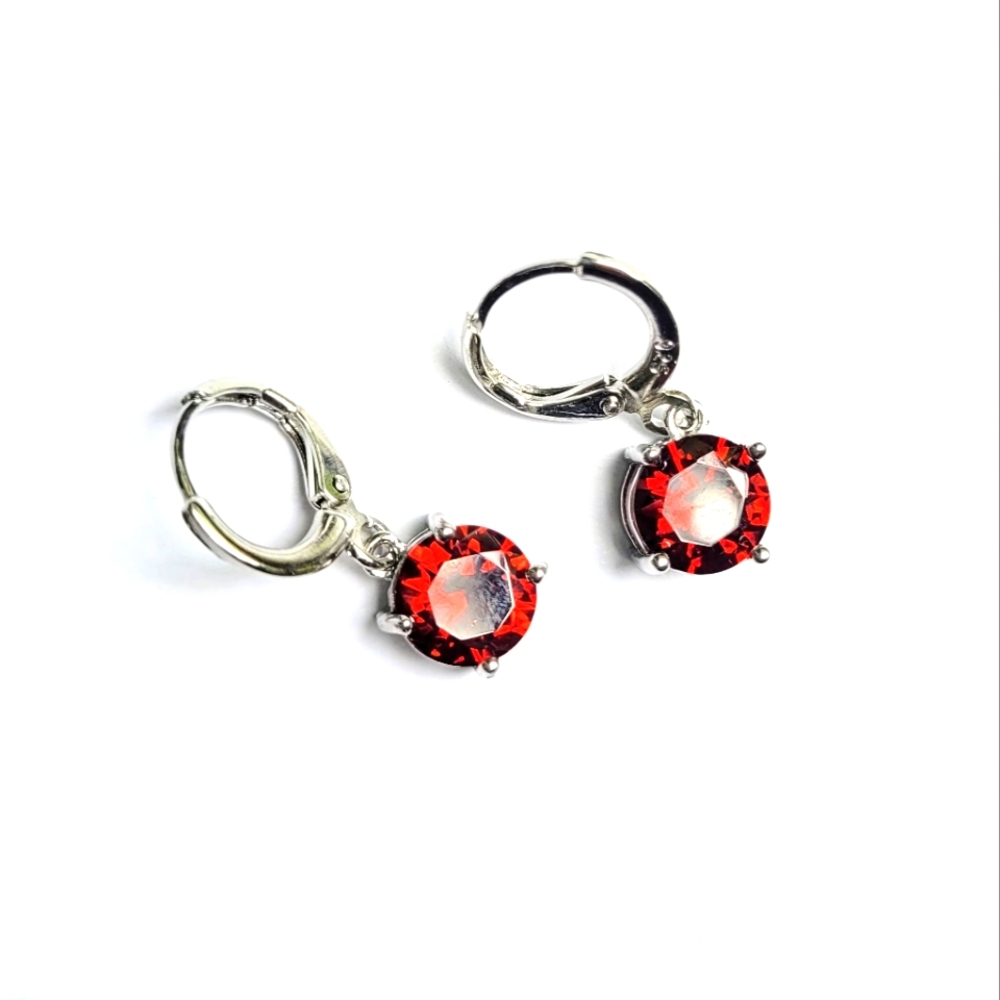 Beautiful ruby red color cubic zirconia 925 silver earrings. Brand new.